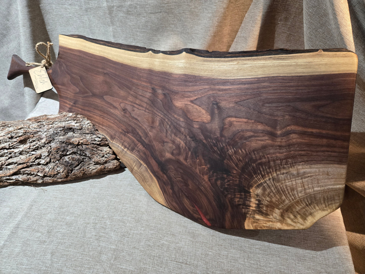 32-1/2" Black Walnut Charcuterie Board w cranberry wine epoxy accent