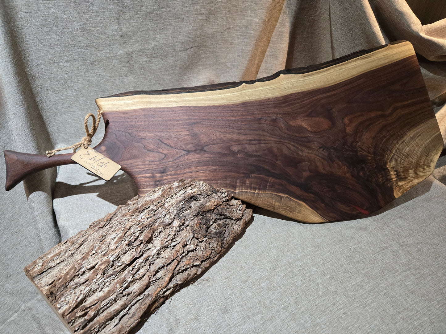 32-1/2" Black Walnut Charcuterie Board w cranberry wine epoxy accent