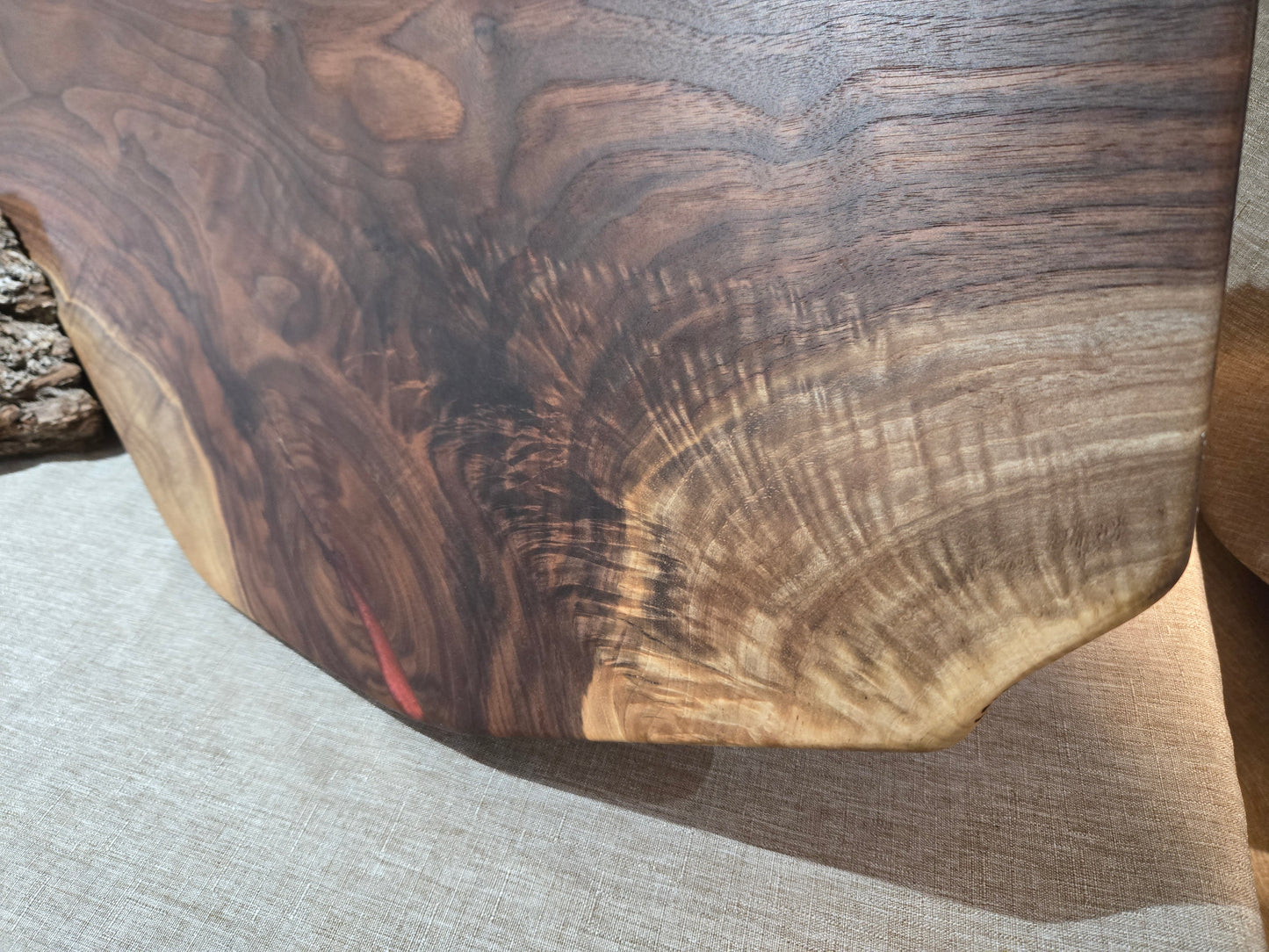 32-1/2" Black Walnut Charcuterie Board w cranberry wine epoxy accent