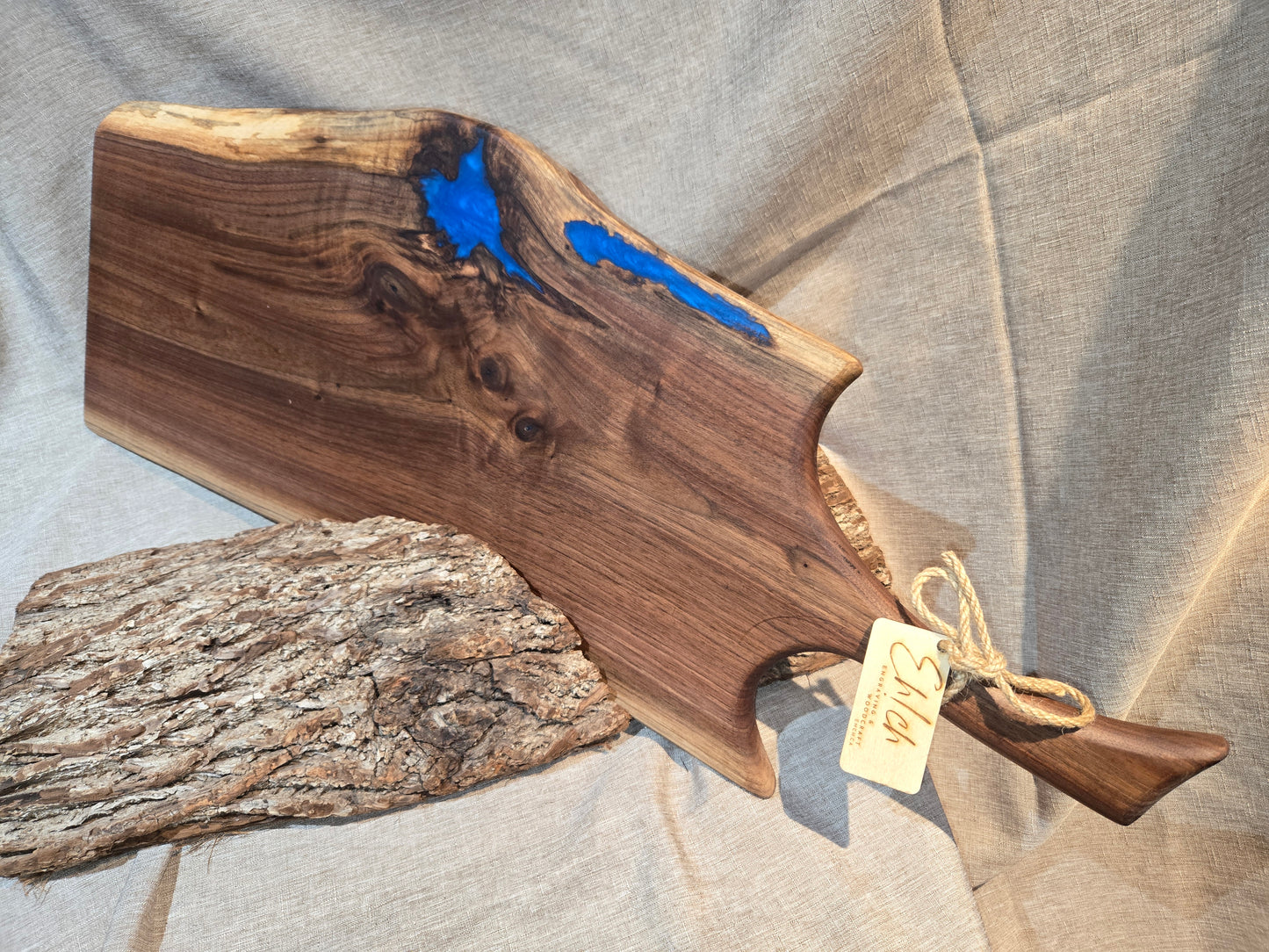 28" Black Walnut Charcuterie Board with sea blue epoxy