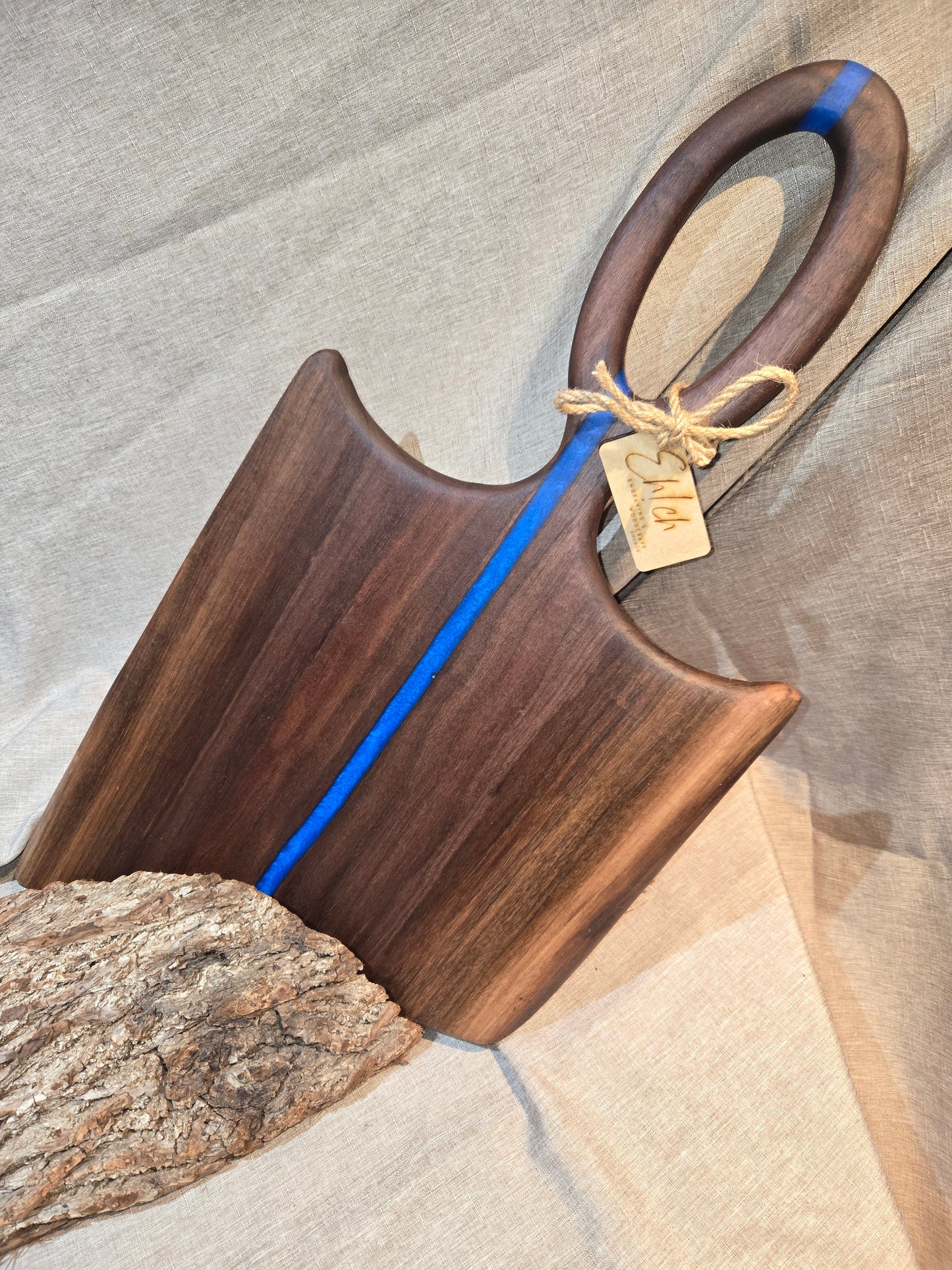 25" Black Walnut Charcuterie Board with sea blue epoxy